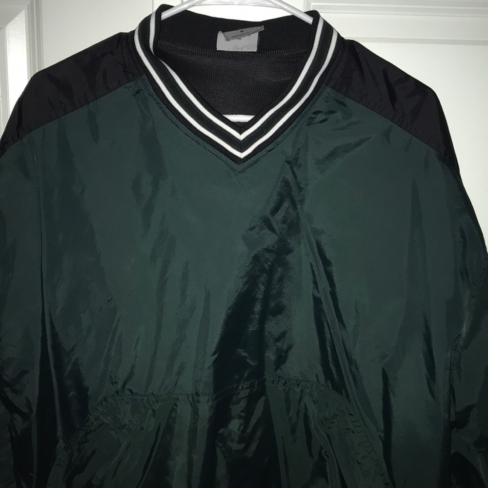 Dark green wind breaker